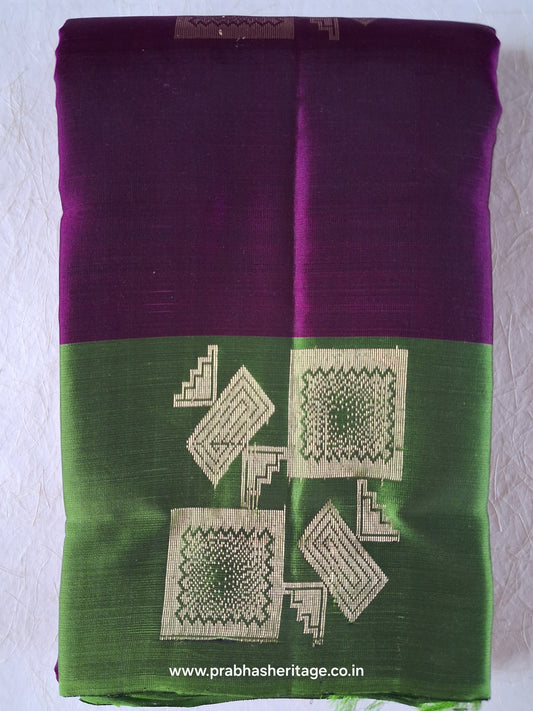 Madhavi Haritha Tarangini short-folded to show the body and leaf-green border