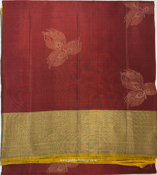 Aruna Kusuma Tarangini short-folded to show the body and zari border