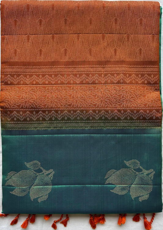 Charukesi Neelanjana Varnam short-folded to show the borderless peacock teal body
