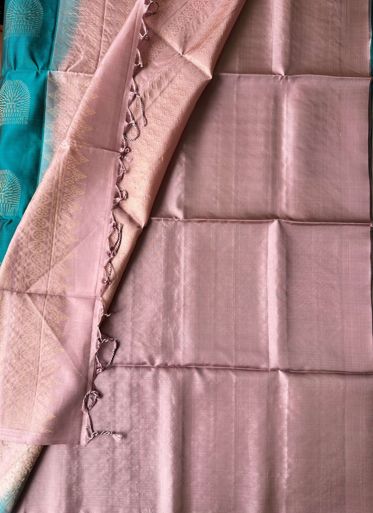 Attached dusty rose-mauve blouse piece with a zari border