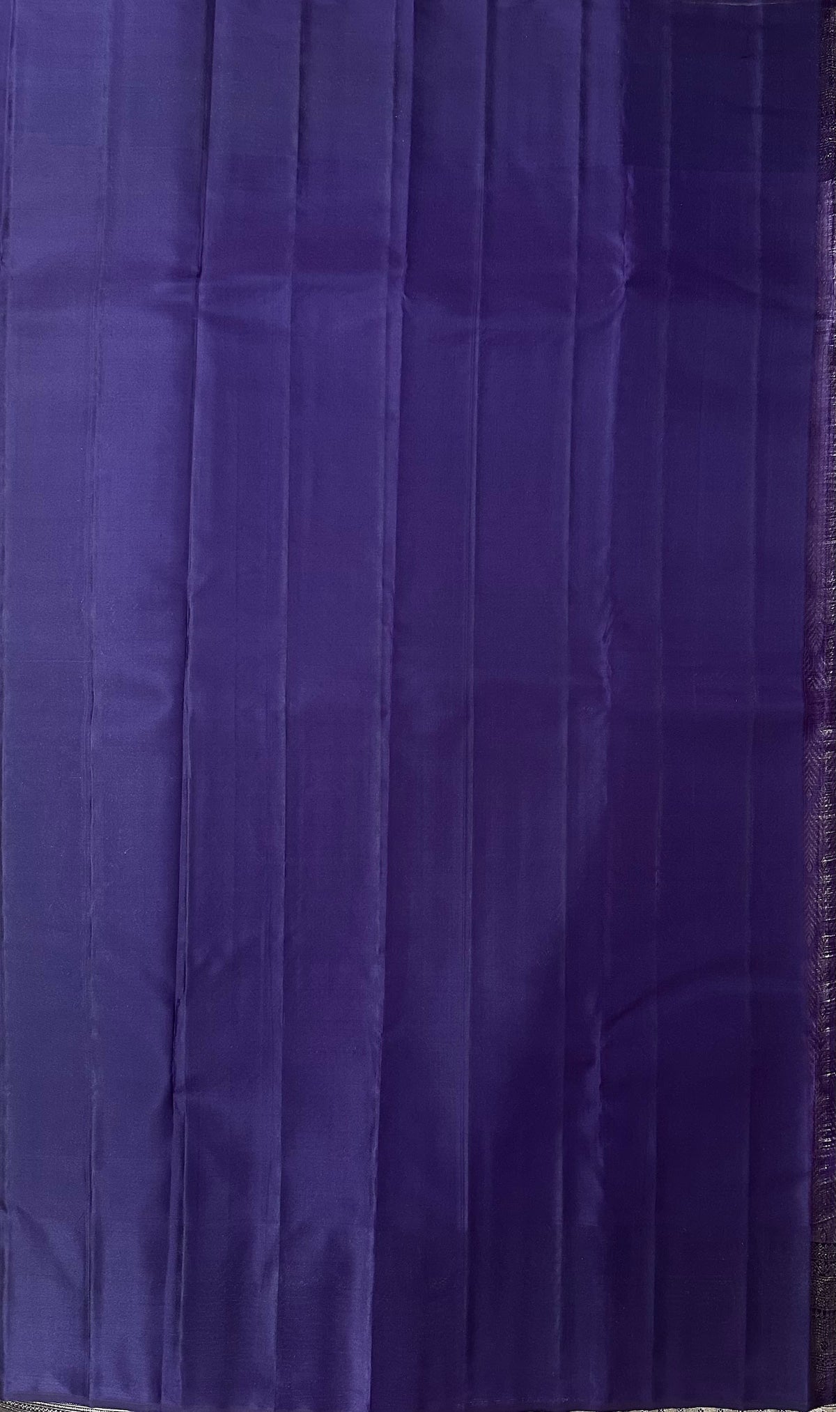 Plain deep violet blouse piece with no zari border