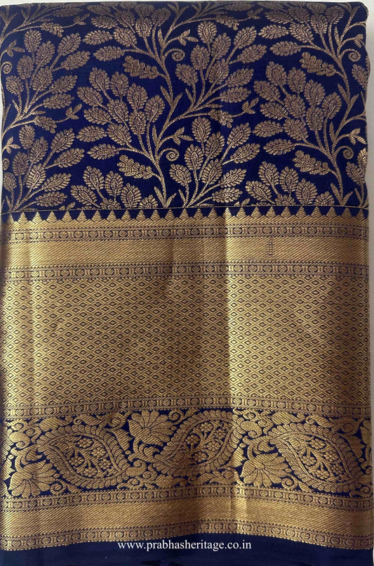 Shankarabharanam Mangala Kanakadhara saree folded to show the body and paisley border