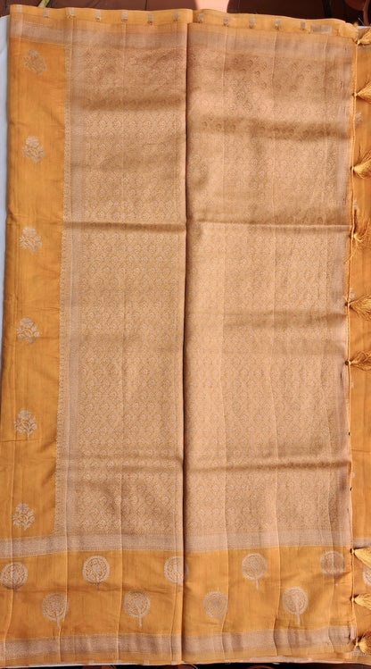 Parrot Kili medallion zari pallu with tassels on Kanaka Varnam golden saree