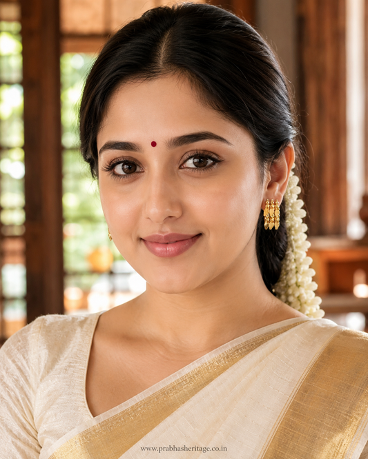 Suvarna Ilakkathali Kammal