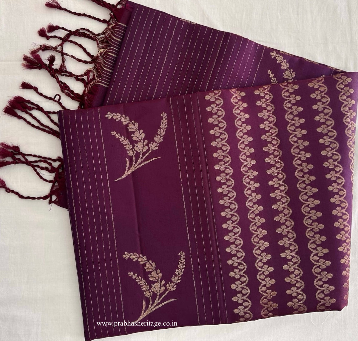 Full length of the saree long-folded, showing body, border and pallu