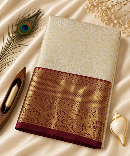 Ivory and wine handloom Kanchipuram pure silk saree with a Korvai border