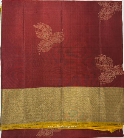 Aruna Kusuma Tarangini short-folded to show the body and zari border