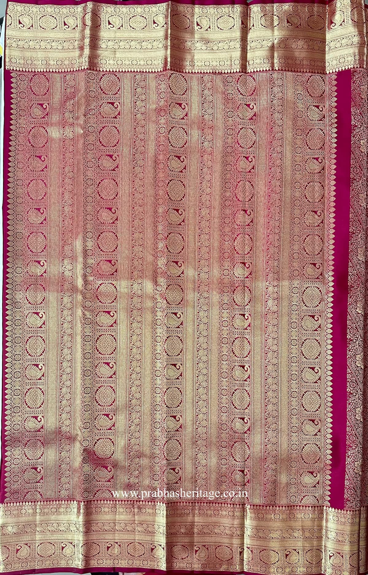 Pallu with dense vertical ornamental panels of paisley and floral roundels in gold zari