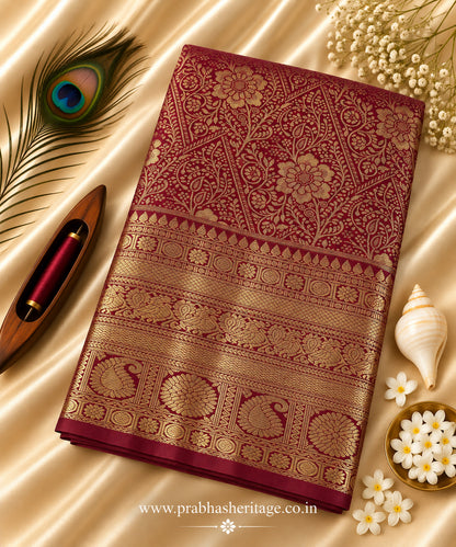 Deep magenta handloom Kanchipuram pure silk bridal saree with gold zari border, portrait