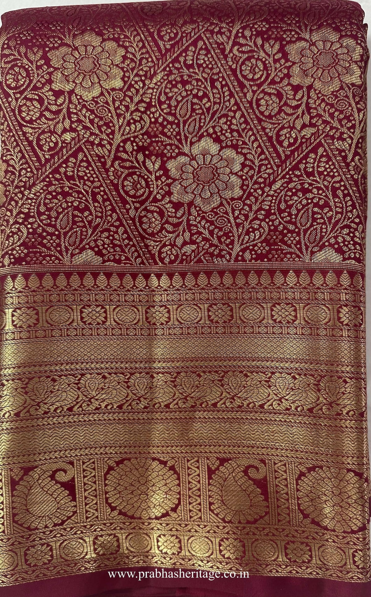 Bhairavi Aruna Prabha short-folded to show the body and gold zari border