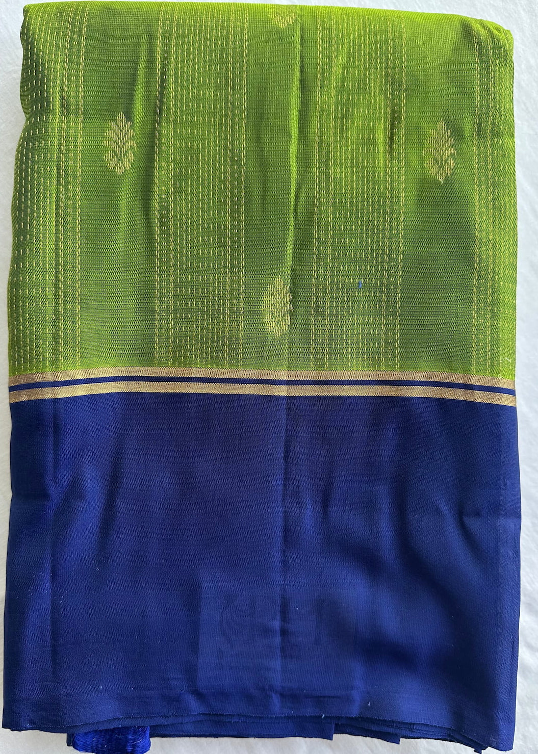 Haritha Neela Tarangini short-folded to show the leaf green body