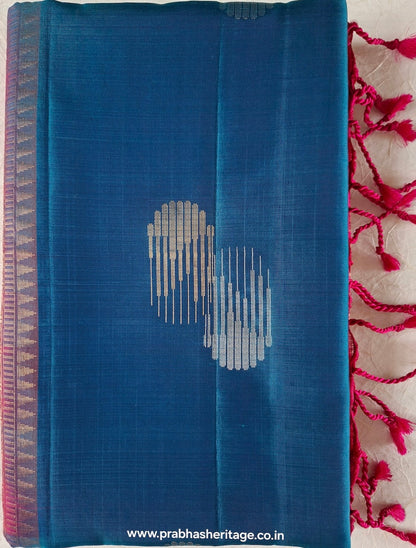 Full length of the saree long-folded, showing the borderless body and rani pink pallu
