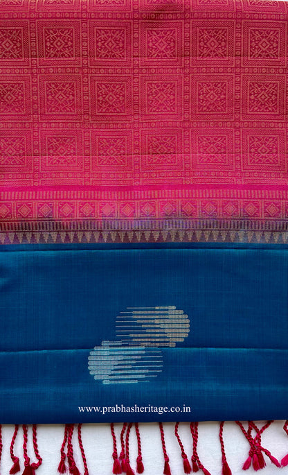 Kalyani Mayil Prabha short-folded to show the borderless peacock blue body