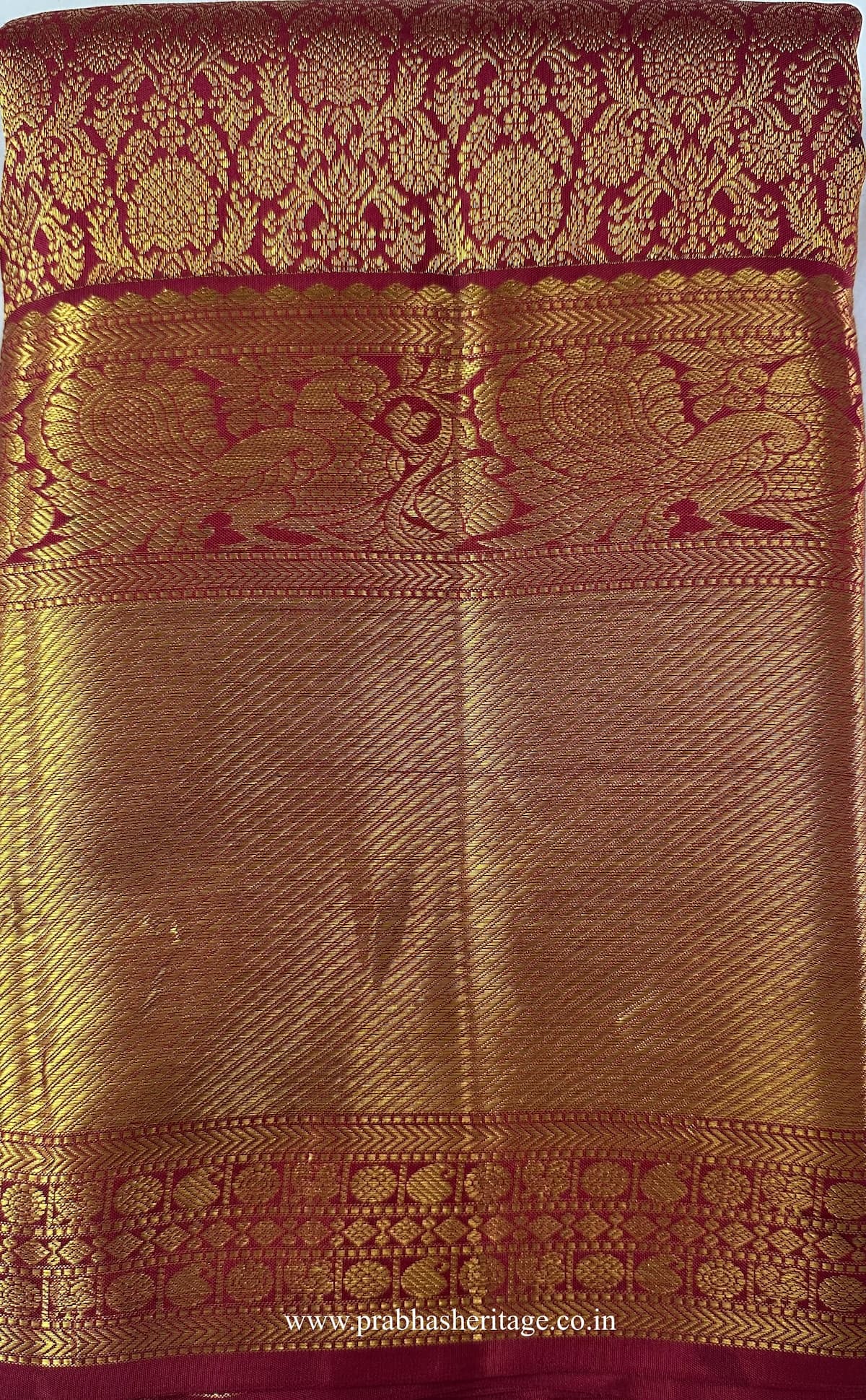 Kalyani Rajalakshmi Vaibhavam saree folded to show the body and broad zari border