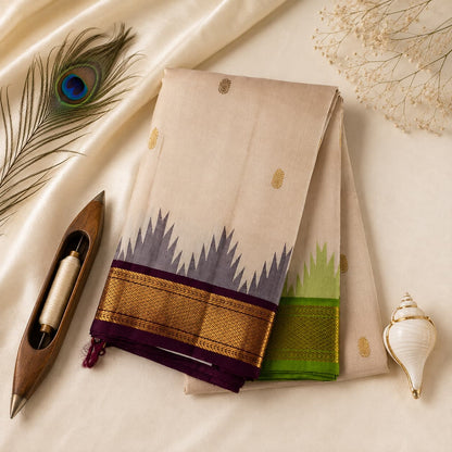 Ivory handloom pure Kanchipuram silk saree with burgundy and leaf green Korvai borders