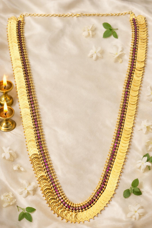 Lakshmi Haram Adukku Kasu Mala shown as a flat lay on ivory fabric