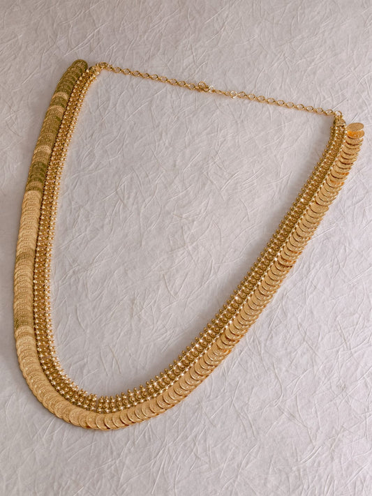 Lakshmi Haram Adukku Kasu Mala shown as a flat lay on an ivory background
