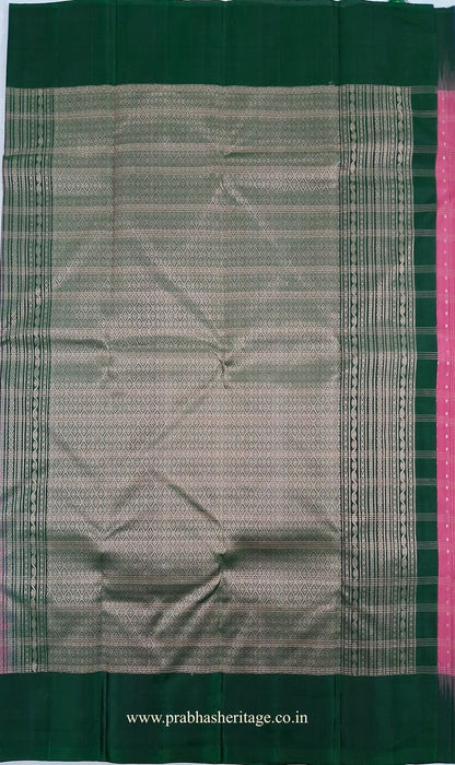 Bottle-green pallu with geometric diamond-like zari motifs and ornamental bands