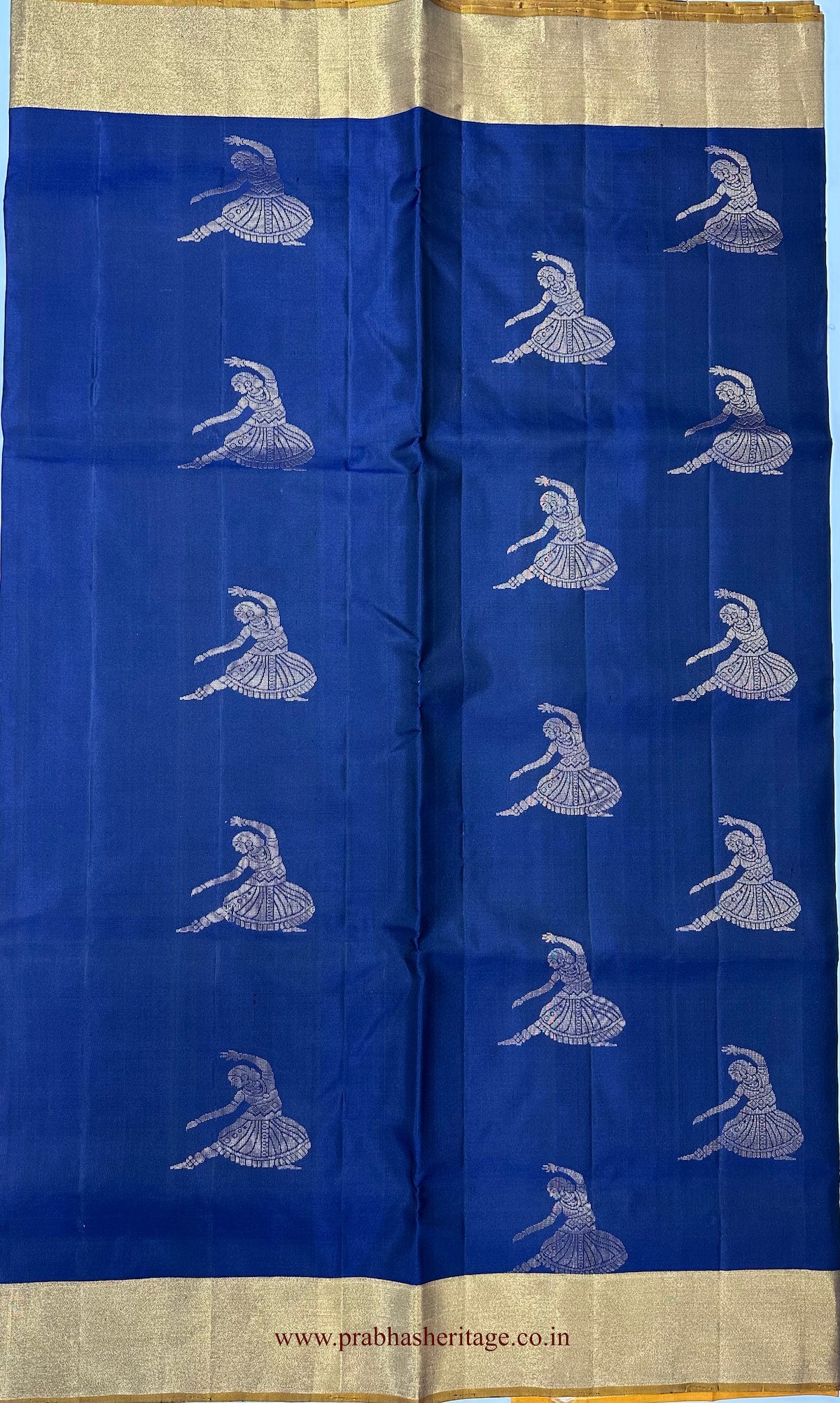 Repeated classical dancer figures on the royal cobalt-blue silk body