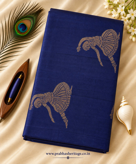 Royal cobalt-blue pure soft silk saree with dancer motifs, portrait