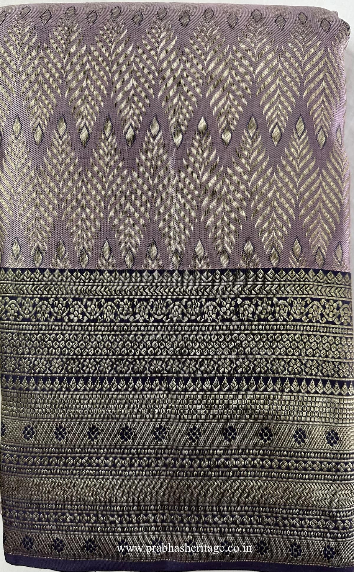 Reetigowla Rajatha Layam saree shown as a short fold, with body and border visible