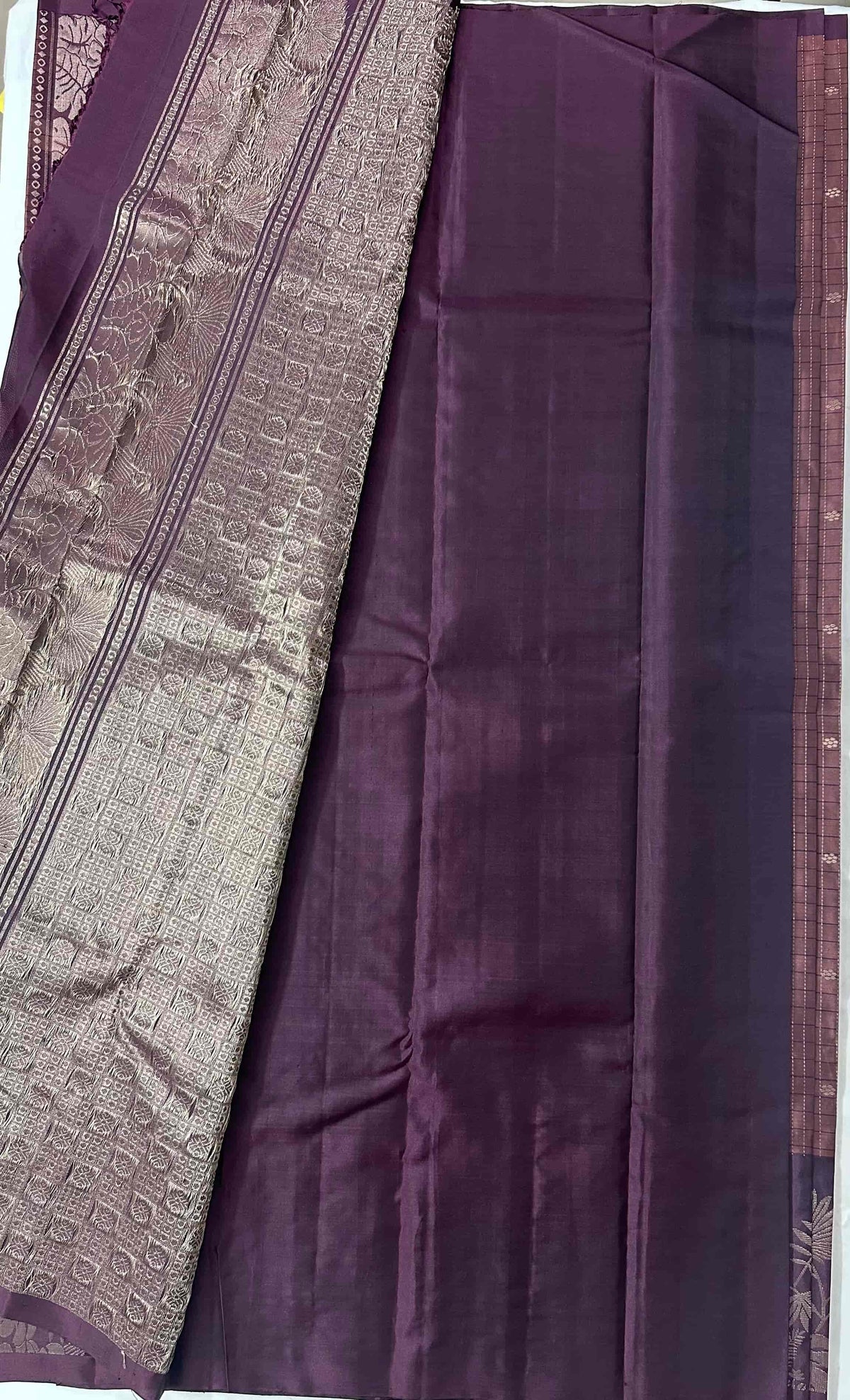Attached deep aubergine-plum running blouse without a zari border
