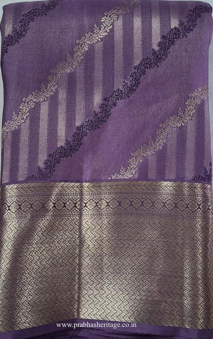 Sahana Lavanya Tharangini short-folded to show the body and gold zari border