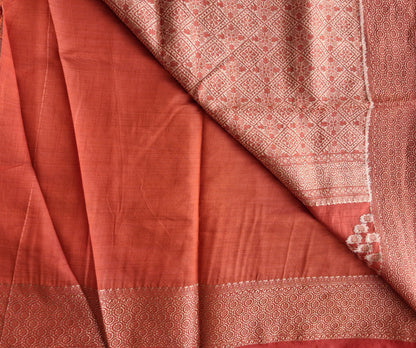 Attached running blouse with zari border on Sengal Varnam brick red semi-tussar saree