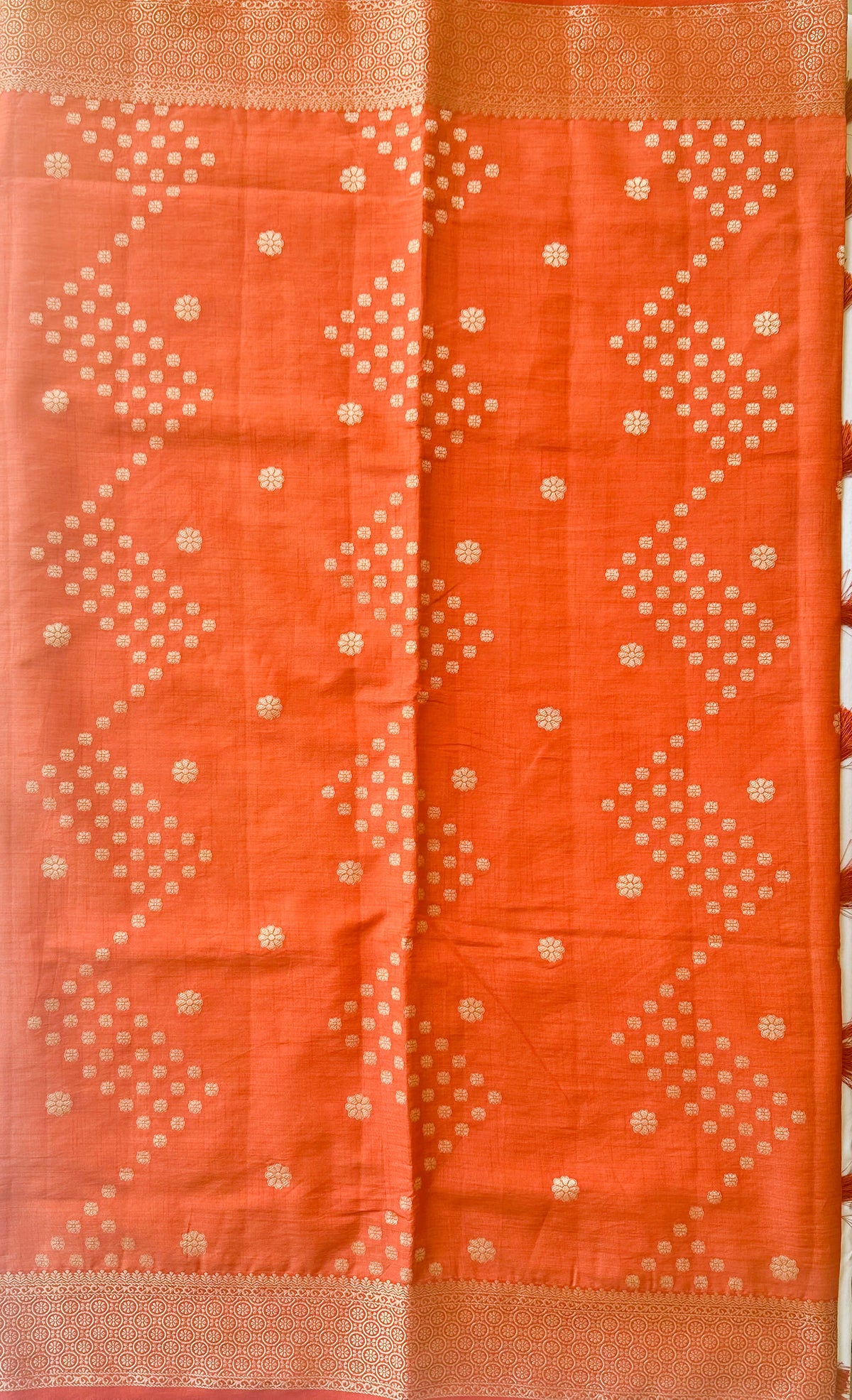 Body detail of Sengal Varnam brick red semi-tussar saree with antique gold zari buttas