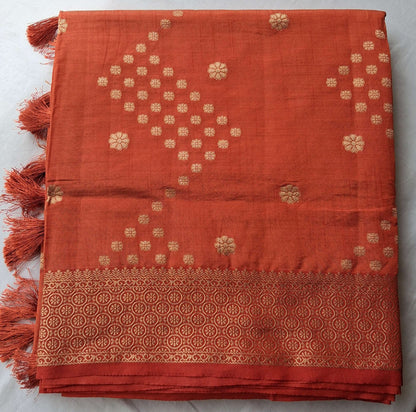 Sengal Varnam brick red semi-tussar saree with antique gold zari buttas and zari border