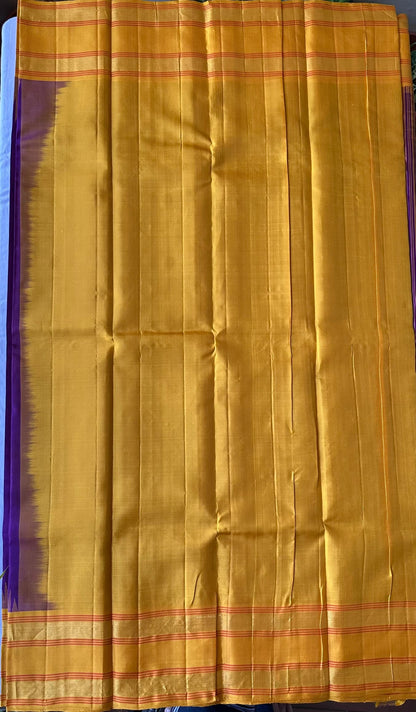 Attached mustard-gold contrast running blouse with a zari border